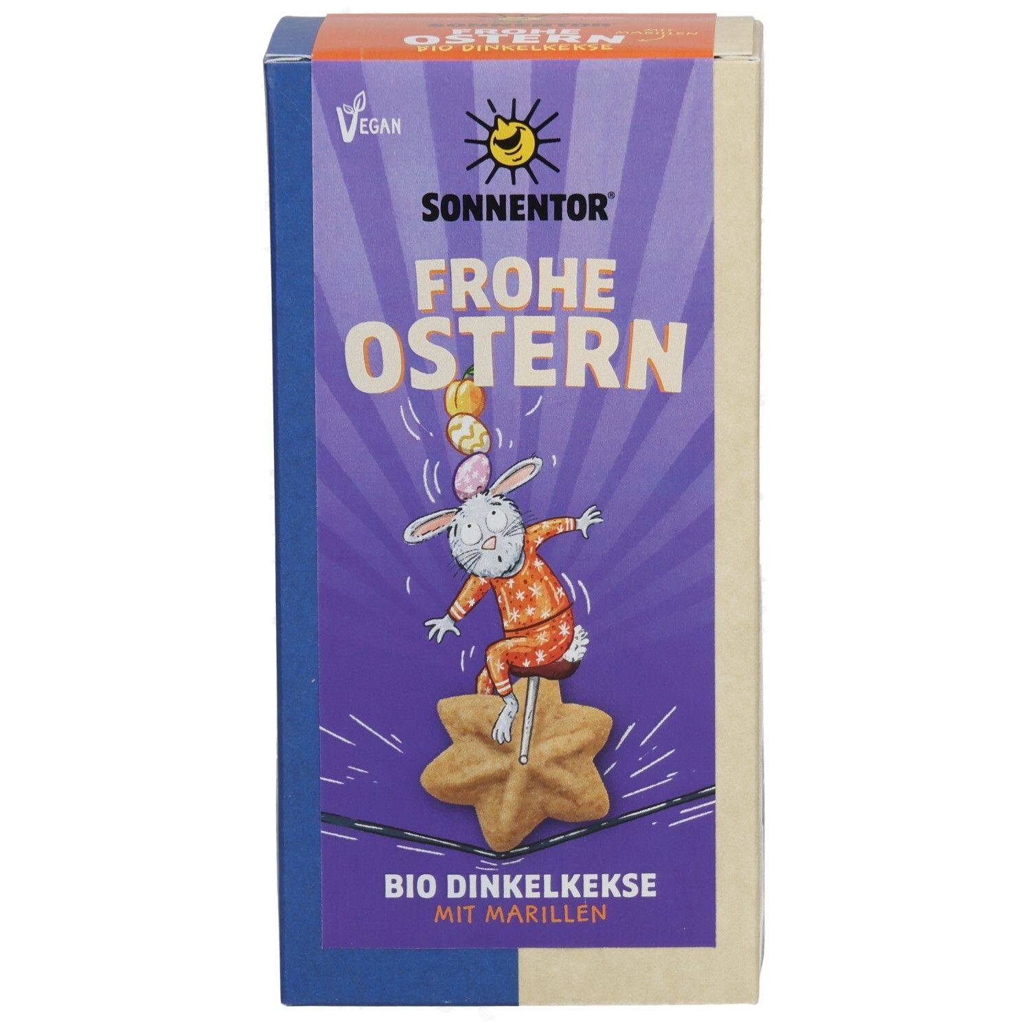 Verpackung mit Keksen. Aufschrift: Frohe Ostern. Vegan. Bio-Dinkelkekse mit Marillen. Illustration: Hase auf Keks.
