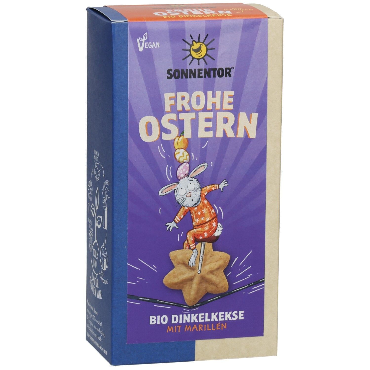 Verpackung mit Keksen. Aufschrift: Frohe Ostern. Vegan. Bio-Dinkelkekse mit Marillen. Illustration: Hase auf Keks.