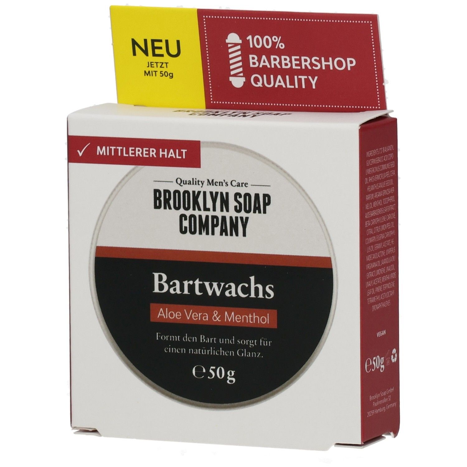 Kartonverpackung mit Bartwachs. Oben: "NEU" und "100% Barbershop Quality". Auf der Vorderseite: "BROOKLYN SOAP COMPANY Bartwachs Aloe Vera & Menthol".