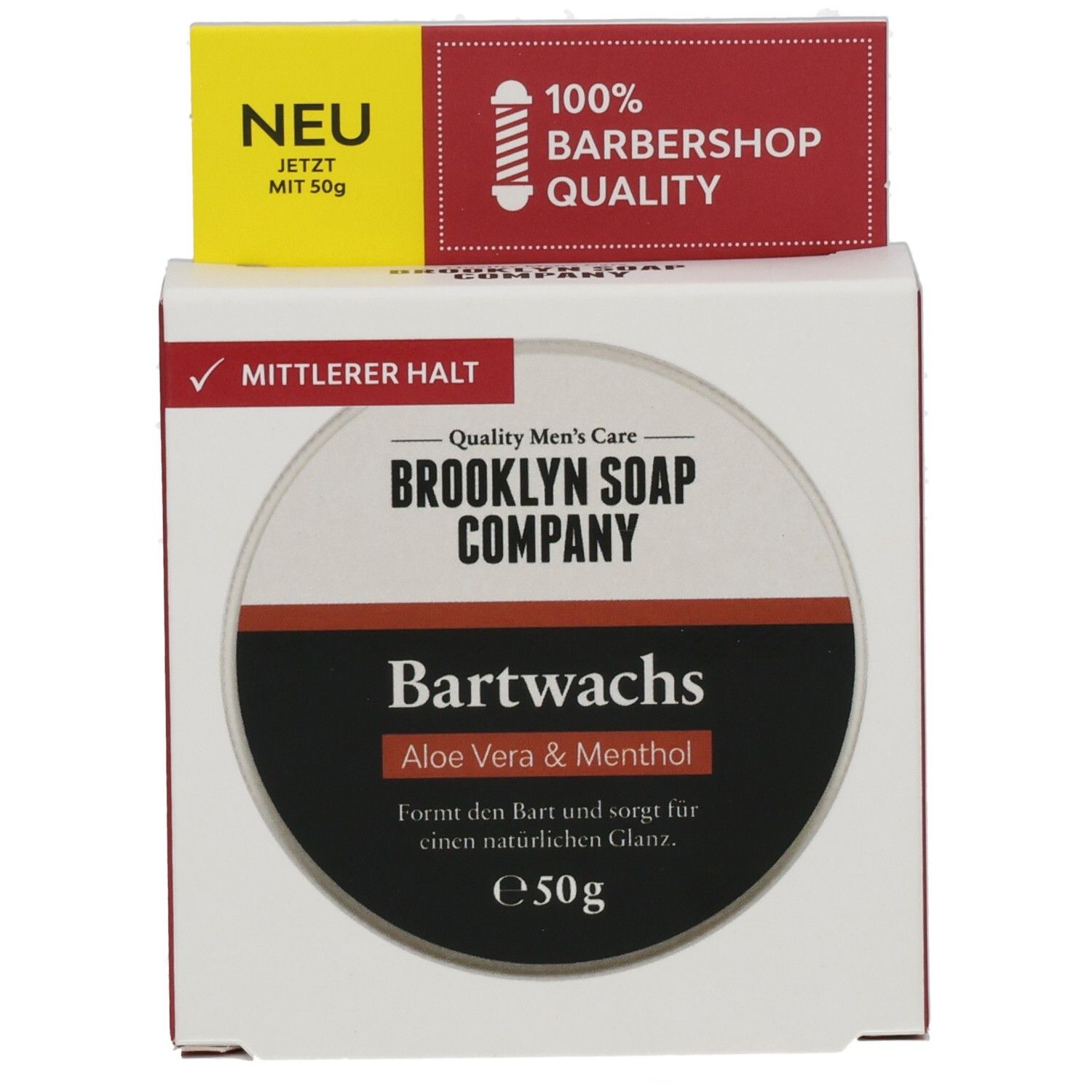 Kartonverpackung mit Bartwachs. Oben: "NEU" und "100% Barbershop Quality". Auf der Vorderseite: "BROOKLYN SOAP COMPANY Bartwachs Aloe Vera & Menthol".