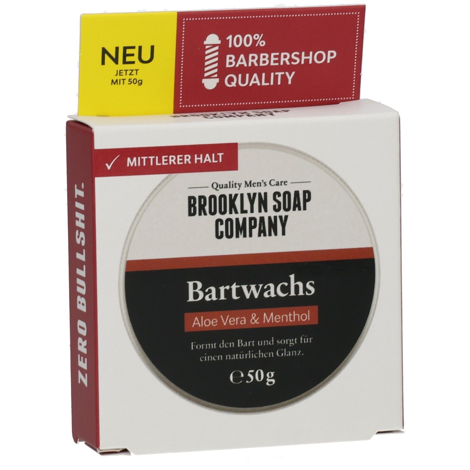 Kartonverpackung mit Bartwachs. Oben: "NEU" und "100% Barbershop Quality". Auf der Vorderseite: "BROOKLYN SOAP COMPANY Bartwachs Aloe Vera & Menthol".