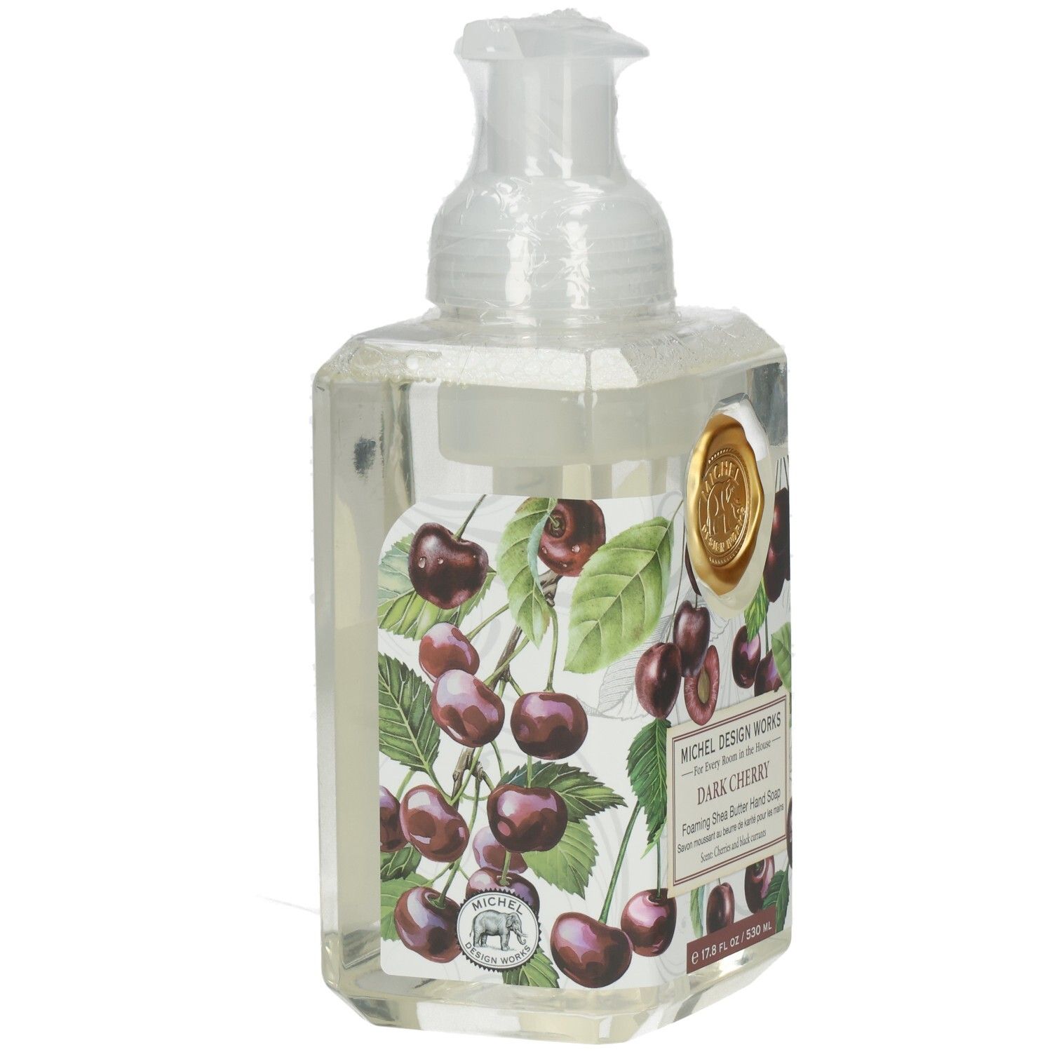 Transparente Seifenflasche mit Kirschmuster und goldenem Siegel. Aufschrift: Dark Cherry. Schaumseife.