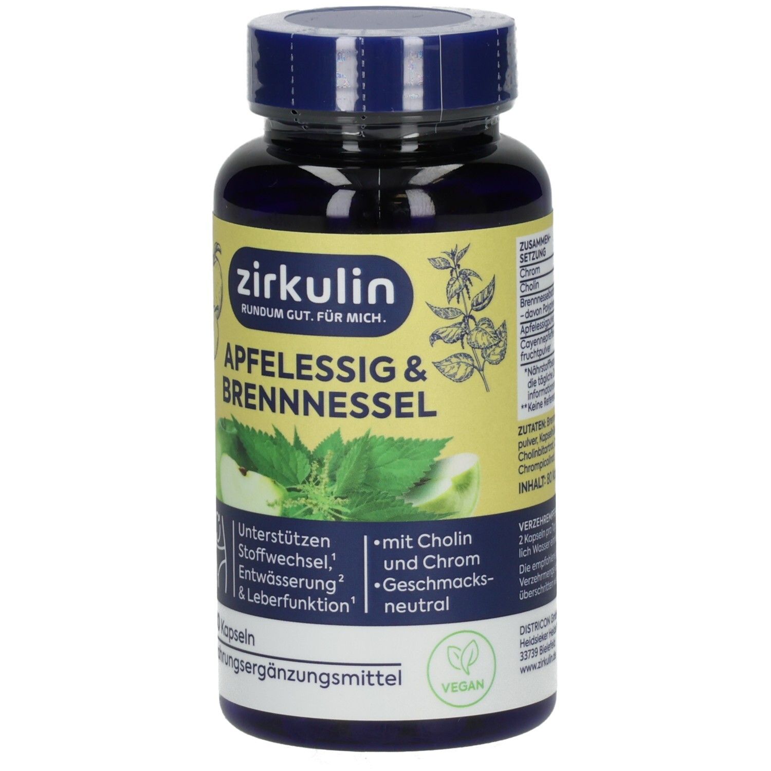 Vorderseite einer dunklen Kapsel mit gelbem Etikett, das Äpfel, Brennnesseln und das vegane Siegel zeigt.