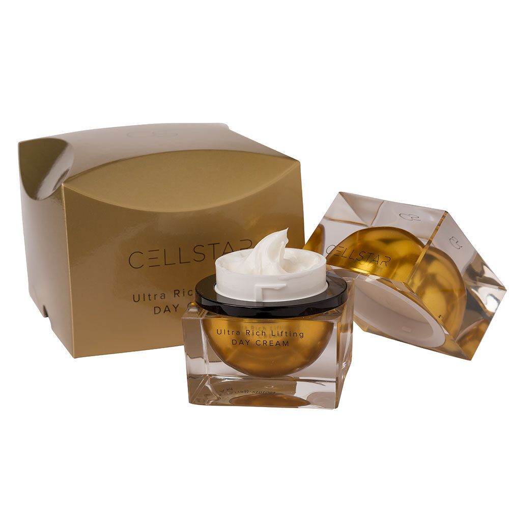 Creme in quadratischem Glasbehälter mit goldener Basis und schwarzem Deckel. Goldene Verpackung mit Produktnamen.