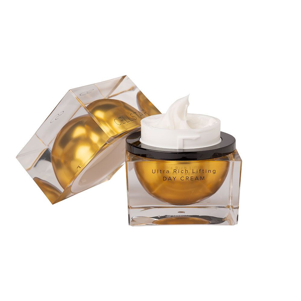 Creme in quadratischem Glasbehälter mit goldener Basis und schwarzem Deckel. Geöffnete Verpackung.
