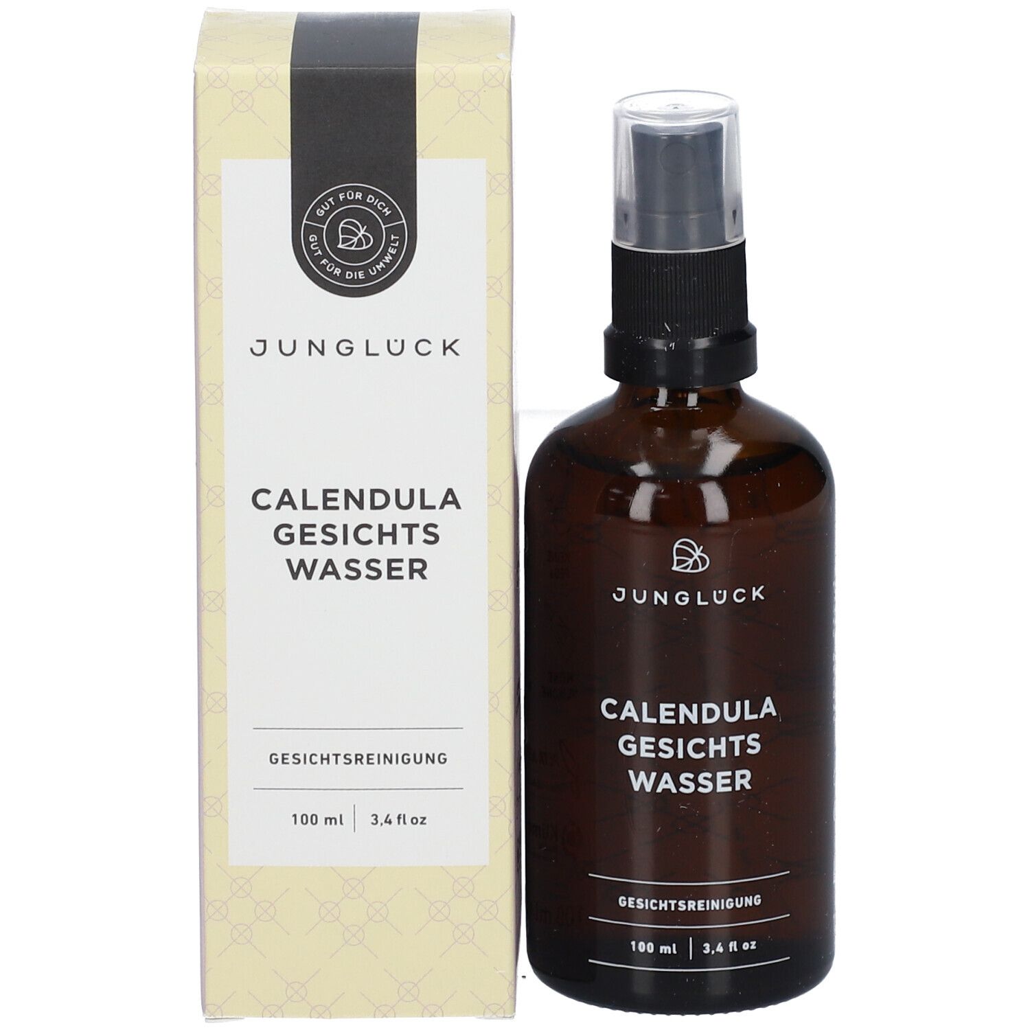 Braune Glasflasche und Verpackung. Aufschrift: JUNGLÜCK, CALENDULA GESICHTS WASSER. Gesichtsreinigung.