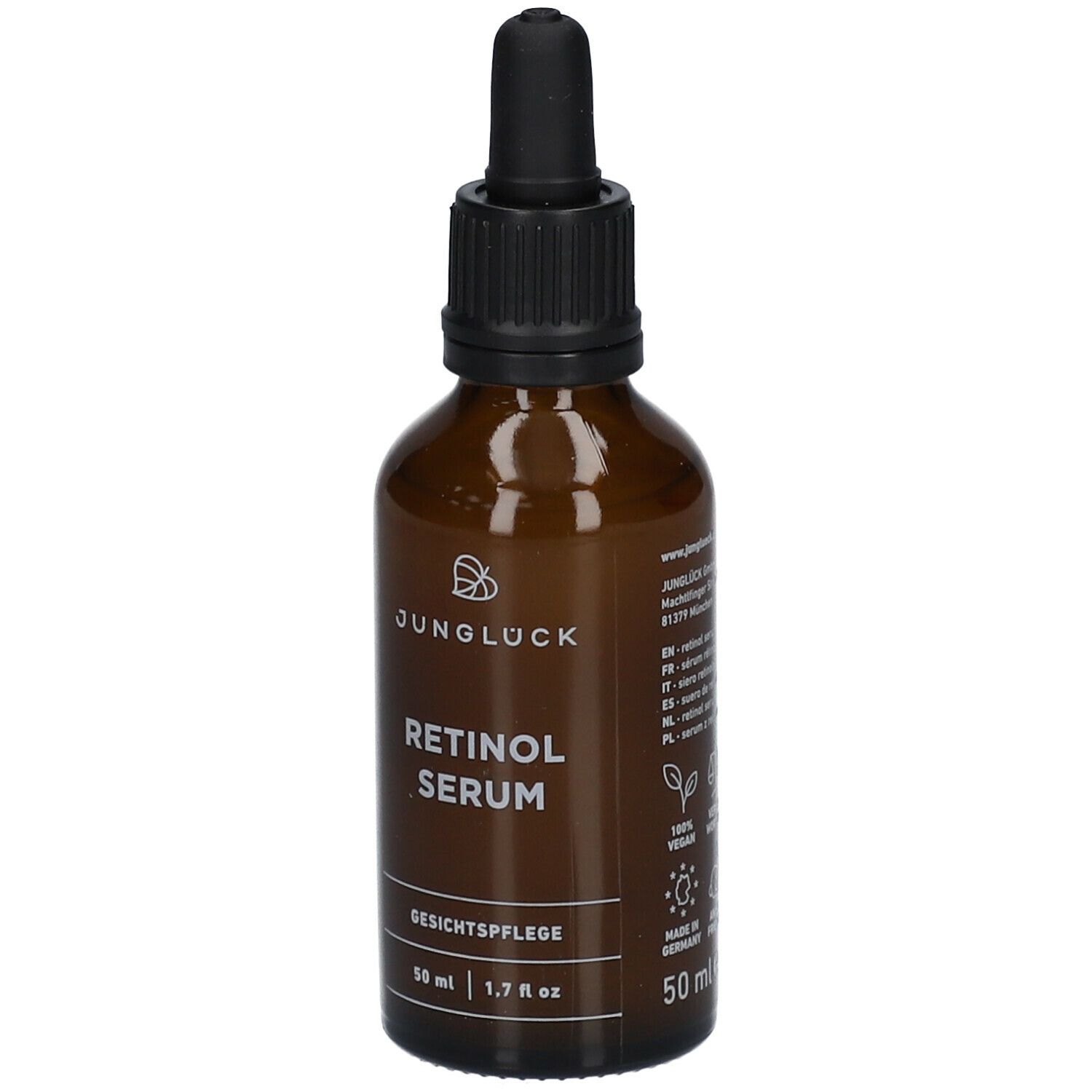 Braune Glasflasche mit schwarzem Tropfer. Aufschrift: JUNGLÜCK, Retinol Serum, Gesichtspflege. 50 ml, 1.7 fl oz.