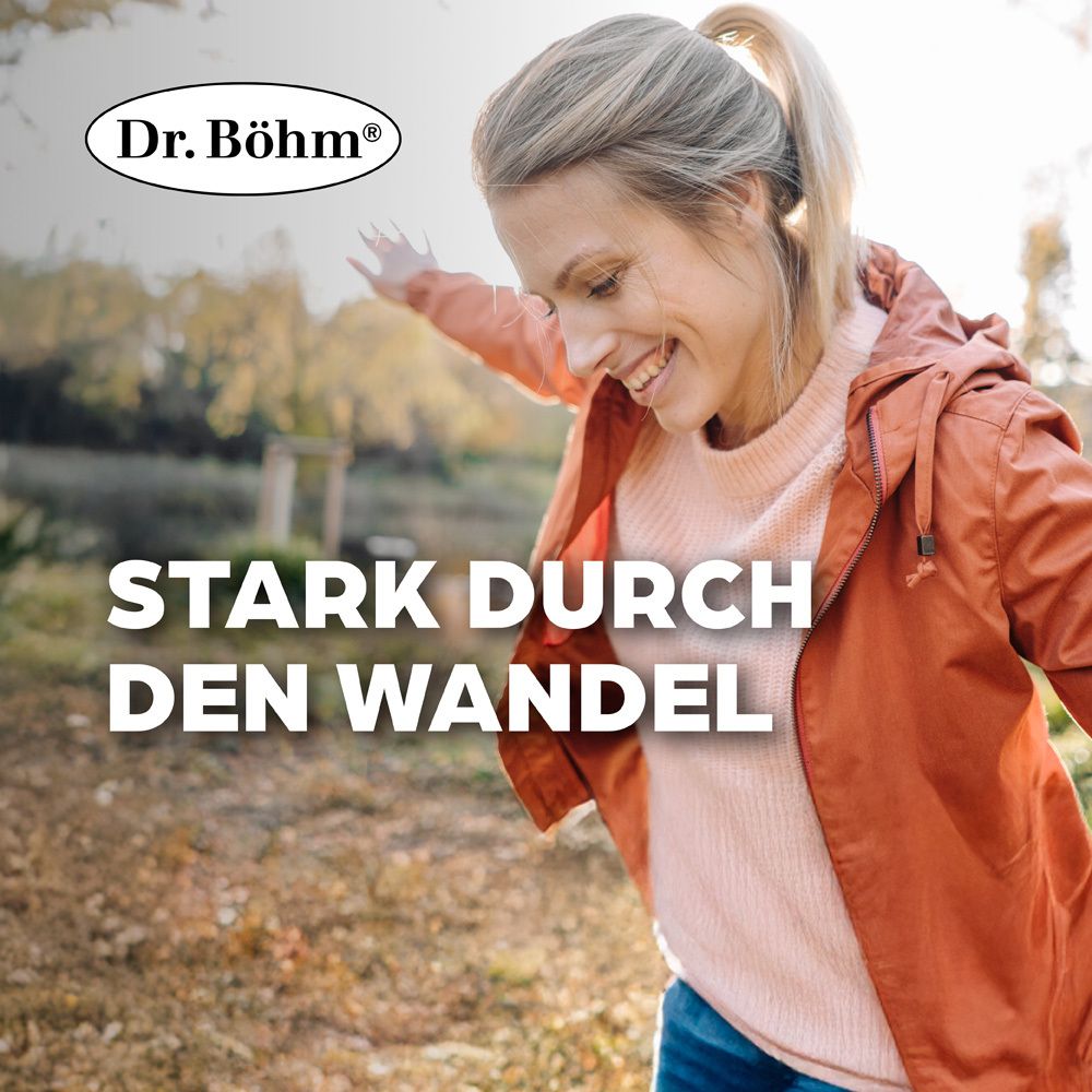 Frau im Freien, lächelnd. Text: Stark durch den Wandel. Logo: Dr. Böhm®.