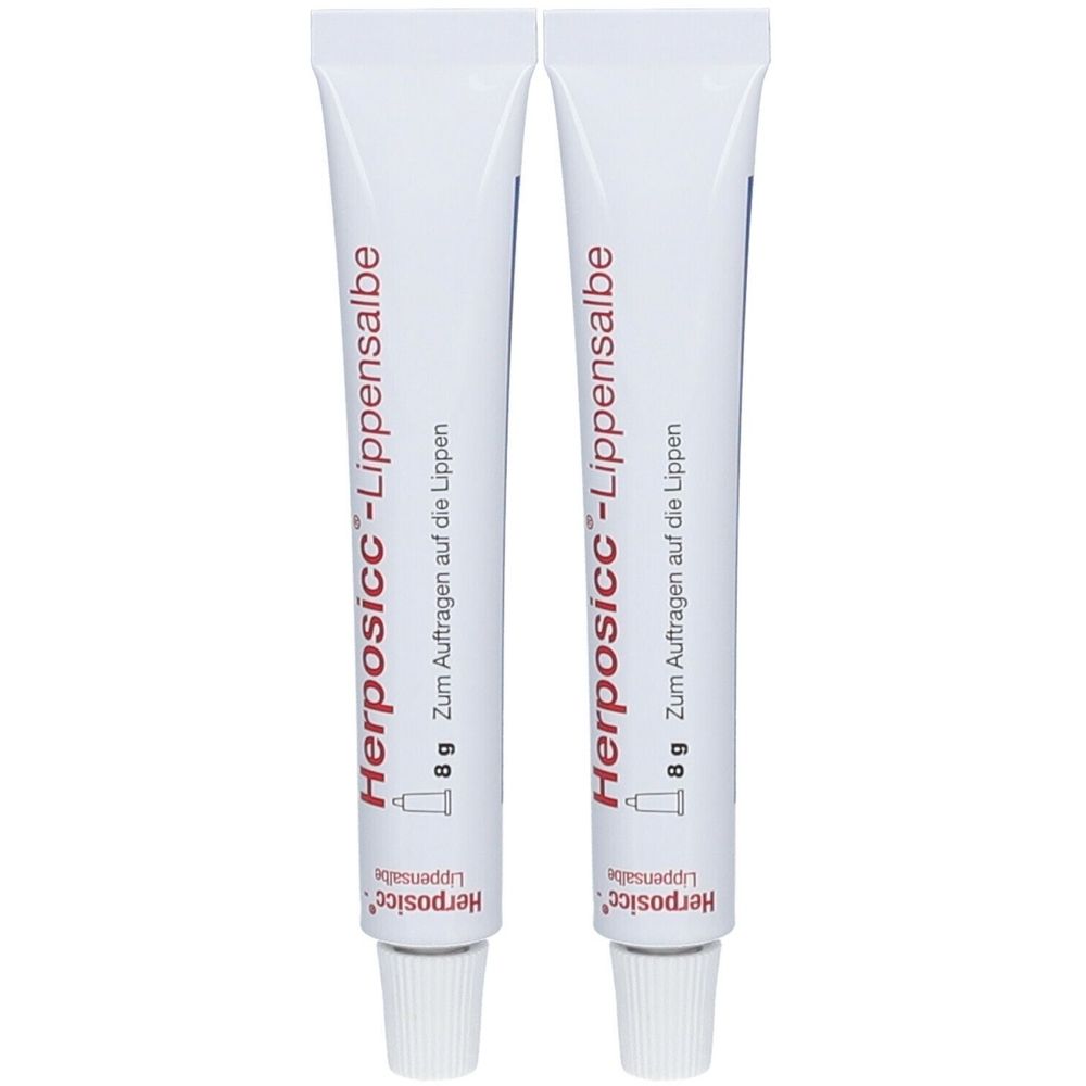 Zwei Tuben Herposicc-Lippensalbe. Weiße Tuben mit roter Schrift. Aufschrift: 8g, Zum Auftragen auf die Lippen.