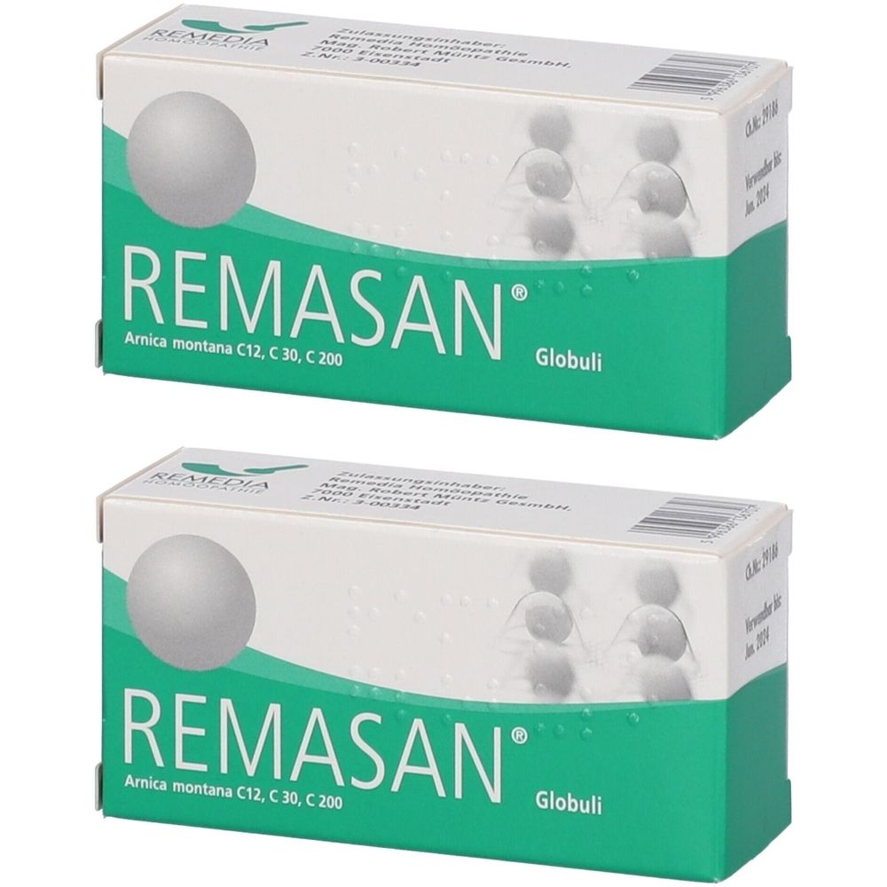 Zwei Schachteln mit der Aufschrift REMASAN Globuli. Aufschrift: Arnica montana C12, C 30, C 200. Weiße und grüne Verpackung.