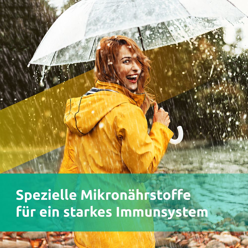 Frau mit gelber Jacke und Regenschirm im Regen. Text: Spezielle Mikronährstoffe für ein starkes Immunsystem.
