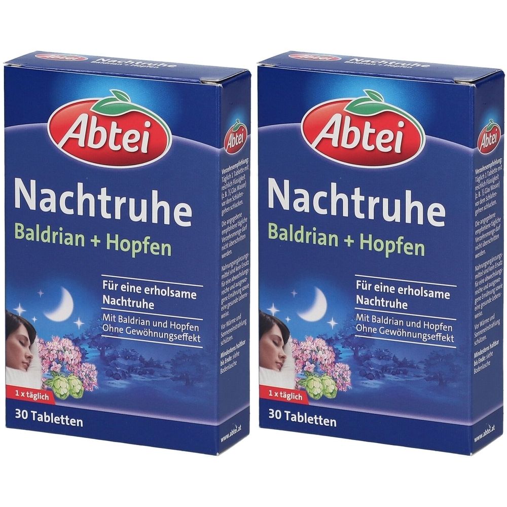 Zwei blaue Schachteln mit "Abtei Nachtruhe". Text: Baldrian + Hopfen, 30 Tabletten. Abbildung einer schlafenden Person und Mond.