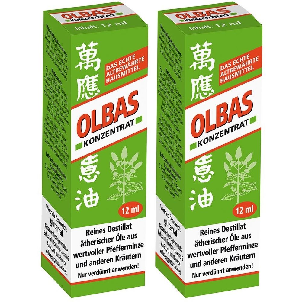 Zwei grüne Kartons mit roter und weißer Schrift. Aufschrift: OLBAS KONZENTRAT, 12 ml. Text in Deutsch und chinesischen Schriftzeichen.