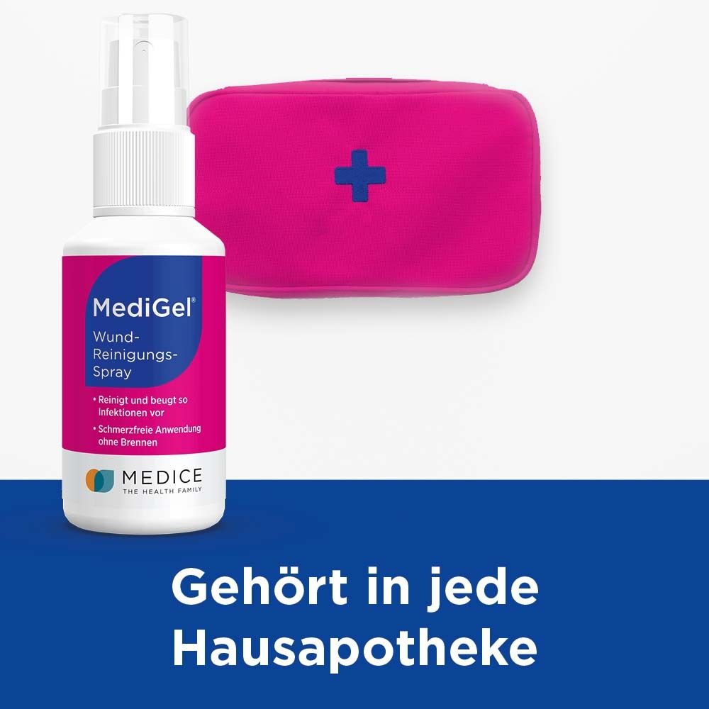 MediGel® Wundreinigungsspray neben roter Erste-Hilfe-Tasche. Text: Gehört in jede Hausapotheke.
