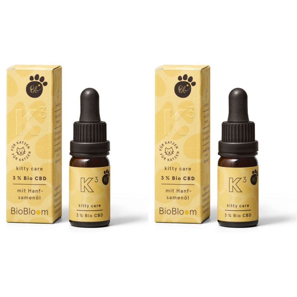 Zwei Flaschen mit Tropfer und Kartons. Aufschrift: kitty care 3% Bio CBD. Marke: BioBloom.