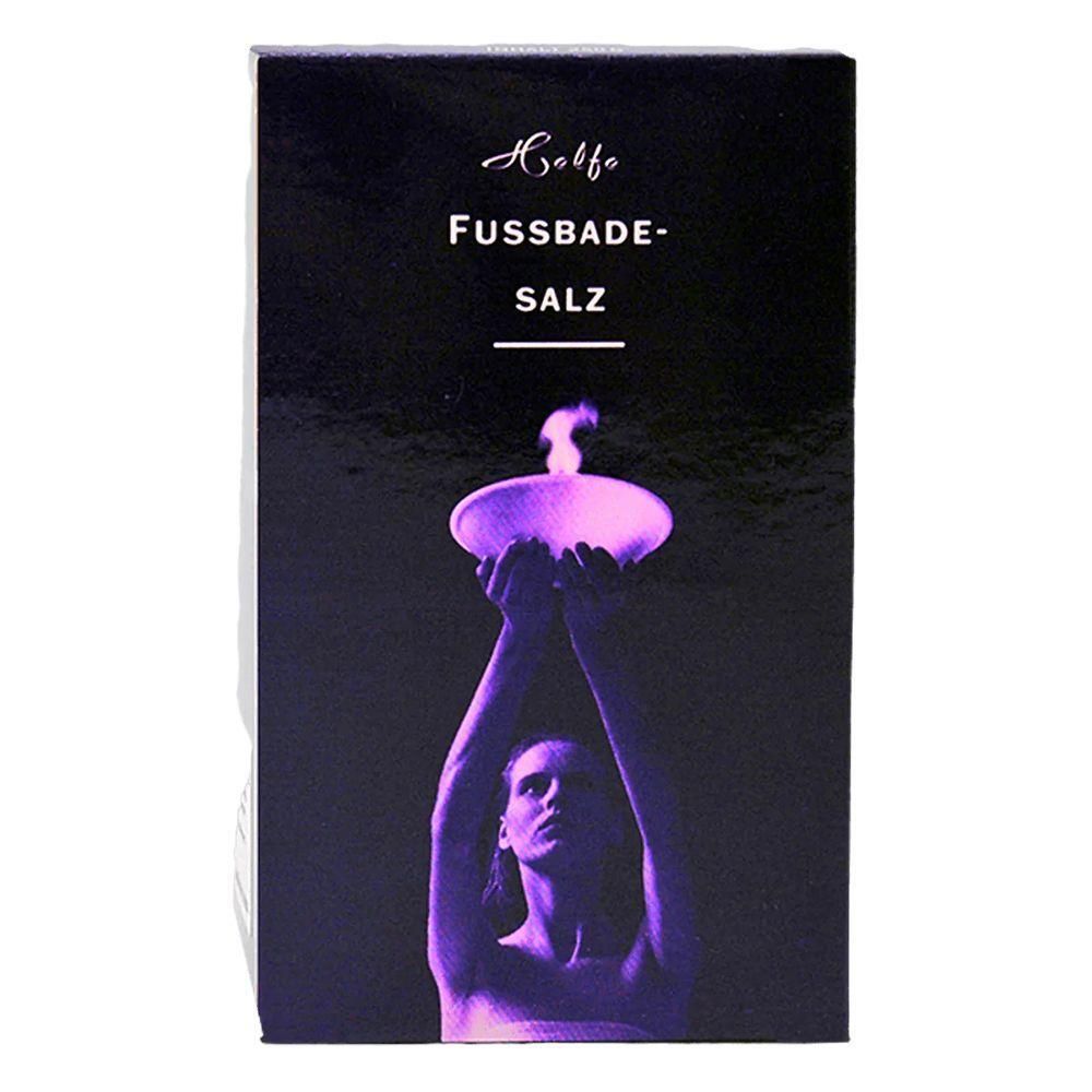 Verpackung für Fußbadesalz mit der Aufschrift 'Helfe Fußbade-Salz'. Eine Frau hält eine Schale mit Flamme.