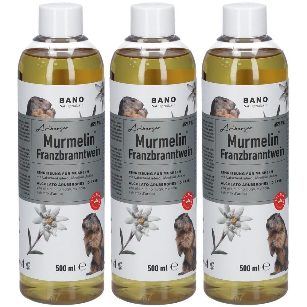 Drei Flaschen BANO Murmelin Franzbranntwein, je 500 ml. Mit Murmeltier- und Edelweiß-Motiv.