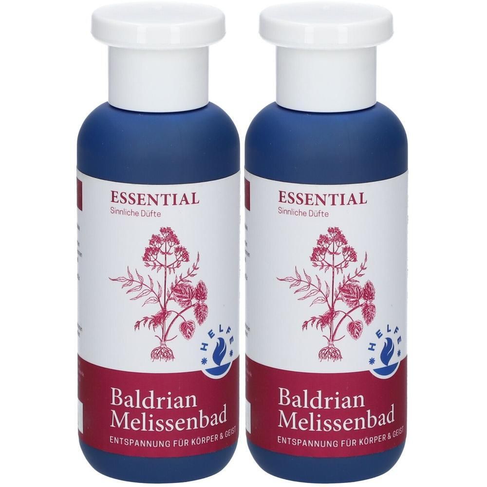 Zwei Flaschen Baldrian Melissenbad mit weißen Verschlüssen und blauen Körpern. Das Etikett zeigt eine Pflanze und den Text "ESSENTIAL".