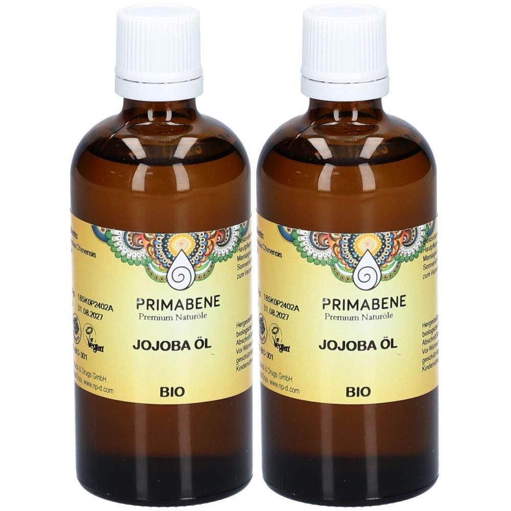 Zwei braune Glasflaschen mit weißem Deckel, gefüllt mit PRIMABENE Jojoba Öl BIO.