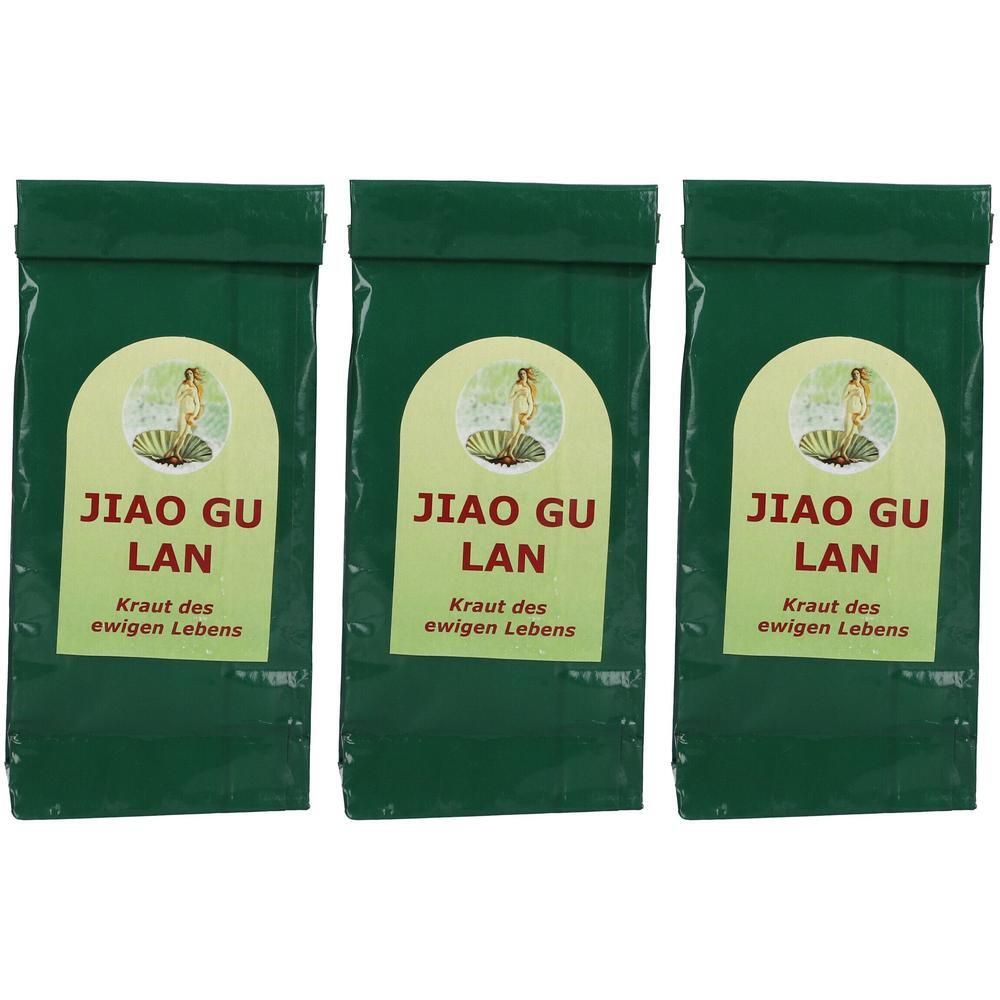 Drei grüne Beutel mit JIAO GU LAN Aufschrift und dem Slogan "Kraut des ewigen Lebens".