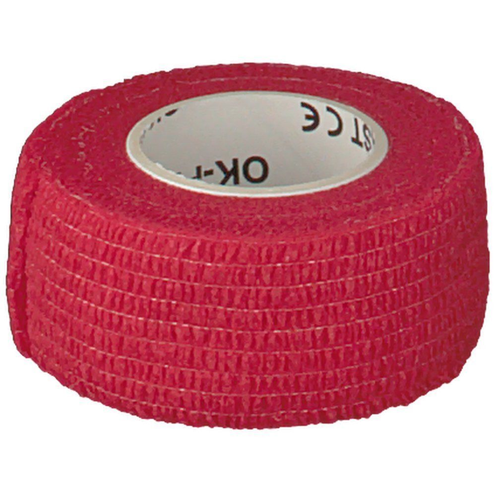 Rotes, selbsthaftendes Verbandmaterial auf einer Rolle, mit Aufdruck 'OK-PLAST' und CE-Zeichen.