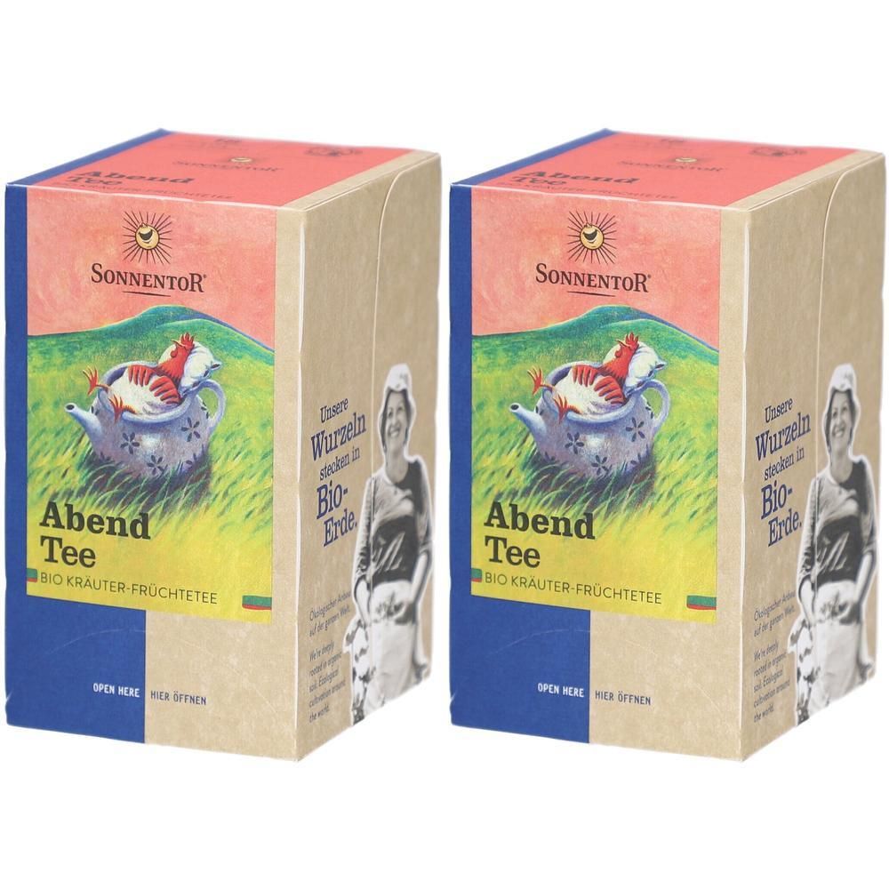 Zwei Packungen Sonnentor Abend Tee, Kräuter-Früchtetee. Vorderseite mit Huhn im Teekessel und Frau.