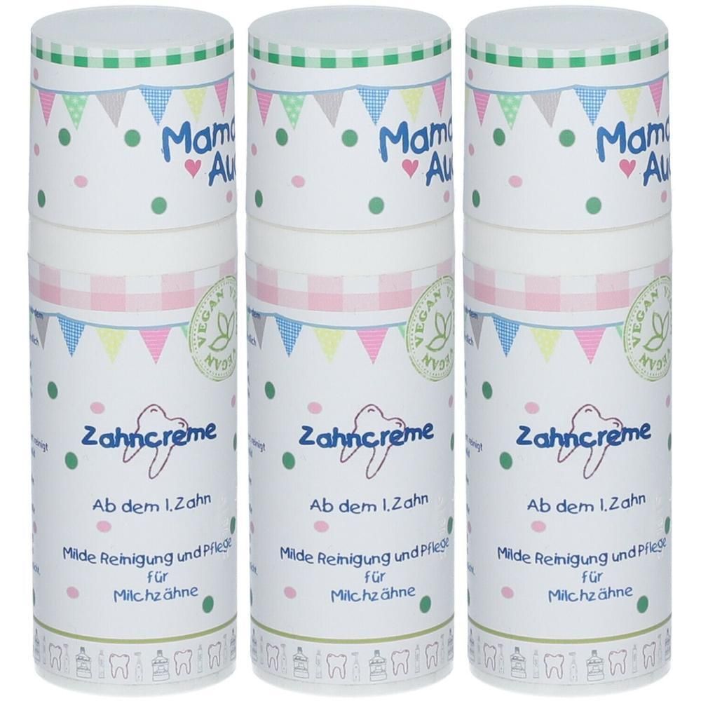 Drei Tuben Zahncreme mit bunten Girlanden und Punkten. "Mama Aua! Zahncreme" und "Vegan" Siegel sichtbar.