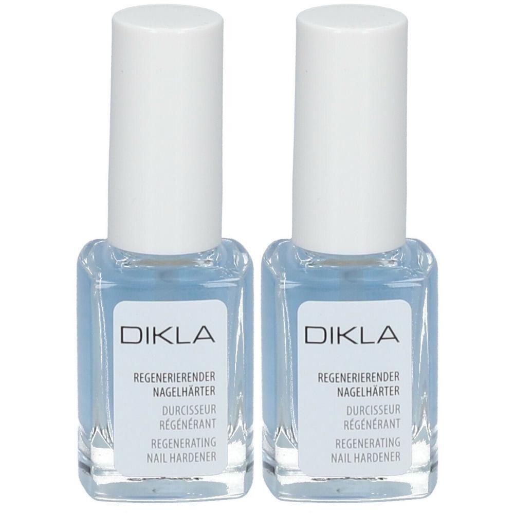 Zwei Flaschen DIKLA Regenerierender Nagelhärter mit weißen Verschlüssen. Klare Flüssigkeit in quadratischen Glasflaschen.