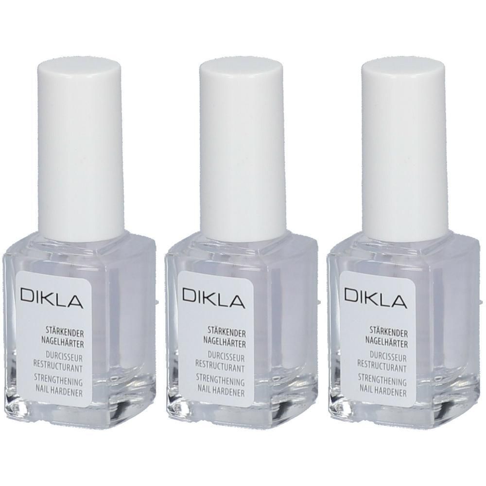 Drei Flaschen DIKLA Stärkender Nagelhärter mit weißen Verschlüssen. Klare Flüssigkeit in transparenten Glasflaschen.