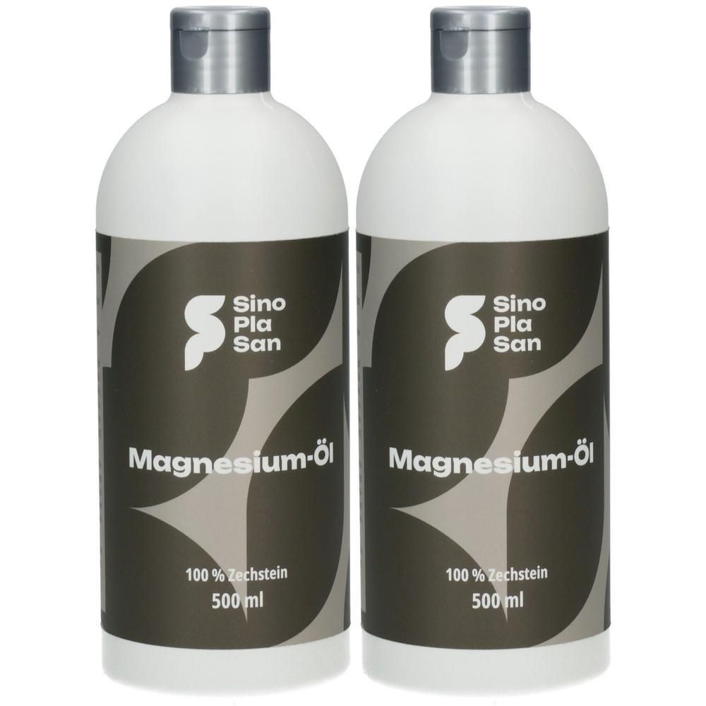 Zwei weiße Flaschen Magnesiumöl, 500 ml Inhalt, mit silbernen Verschlüssen und dunklem Etikett.