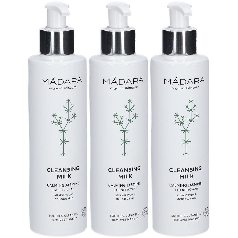 Drei weiße Pumpflaschen mit MÁDARA Cleansing Milk, Calming Jasmine.