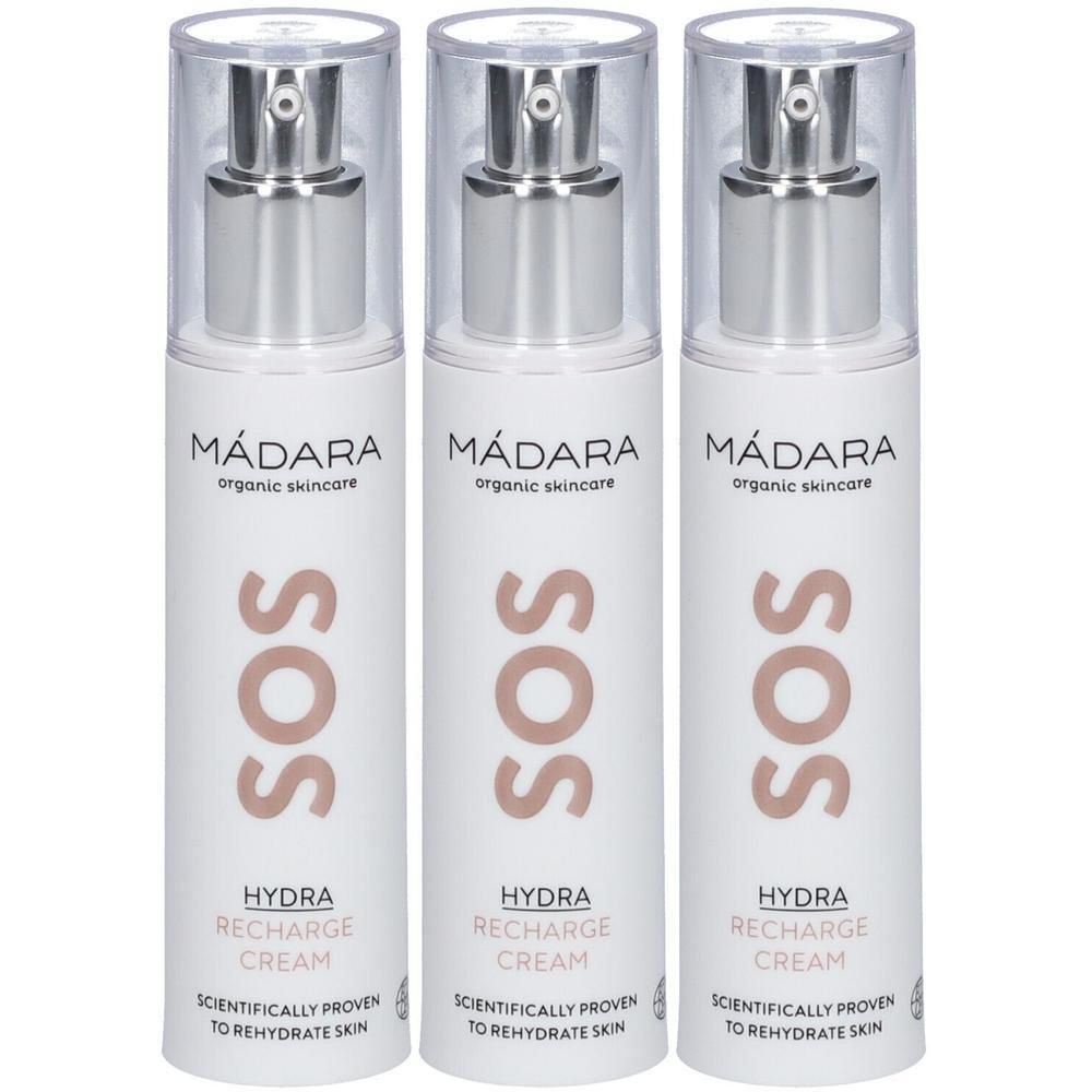 Drei MÁDARA SOS Hydra Recharge Cream Spenderflaschen mit Pumpsystem.