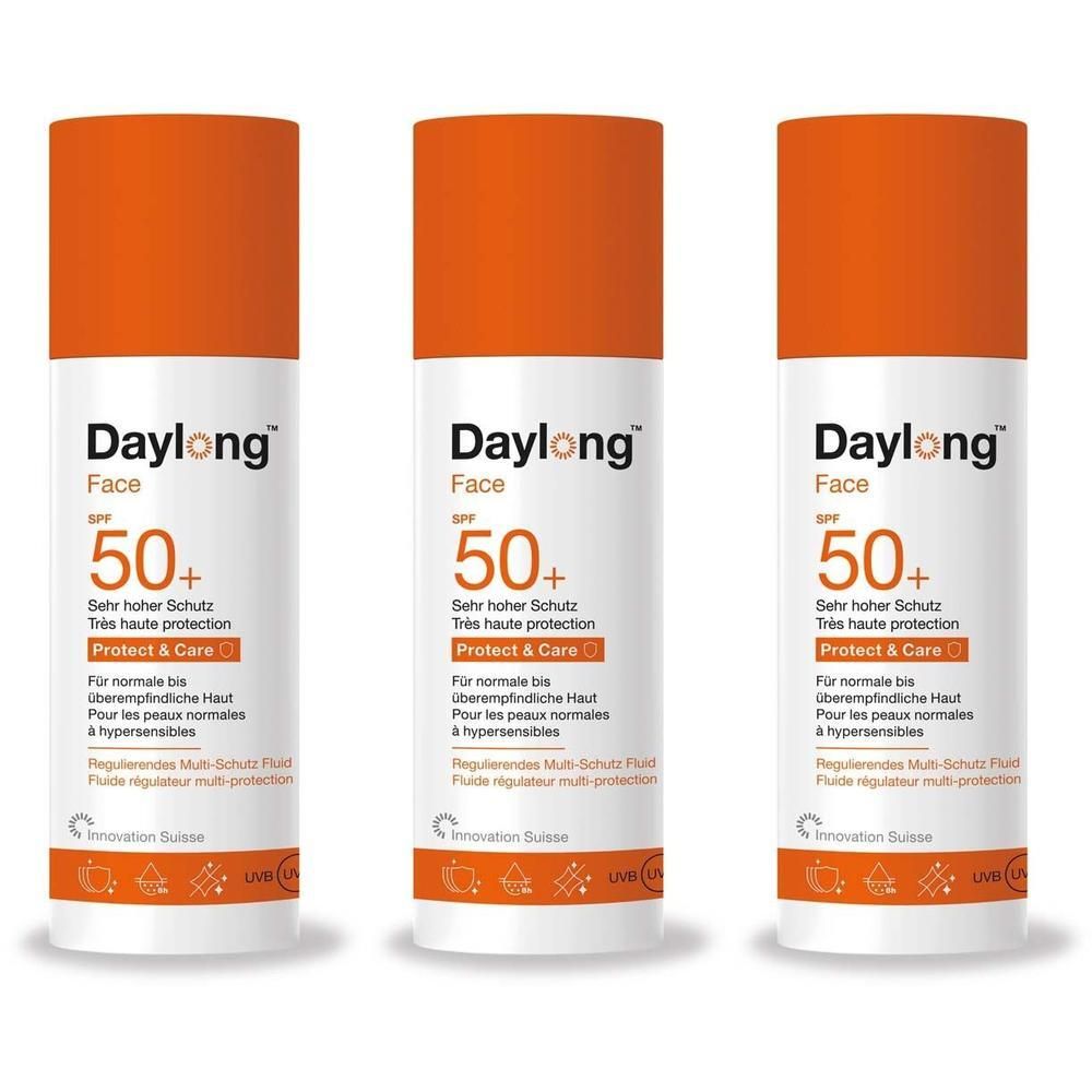 Drei Flaschen Daylong Protect & Care Face Multi-Schutz Fluid SPF 50+ mit orangen Verschlüssen.
