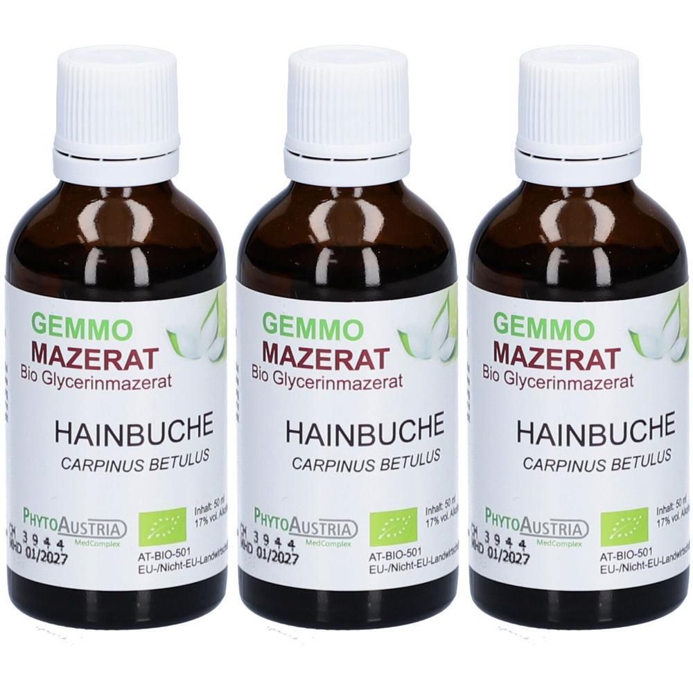 Drei braune Glasflaschen mit weißen Verschlüssen, gefüllt mit PhytoAustria Gemmo Mazerat Hainbuche.