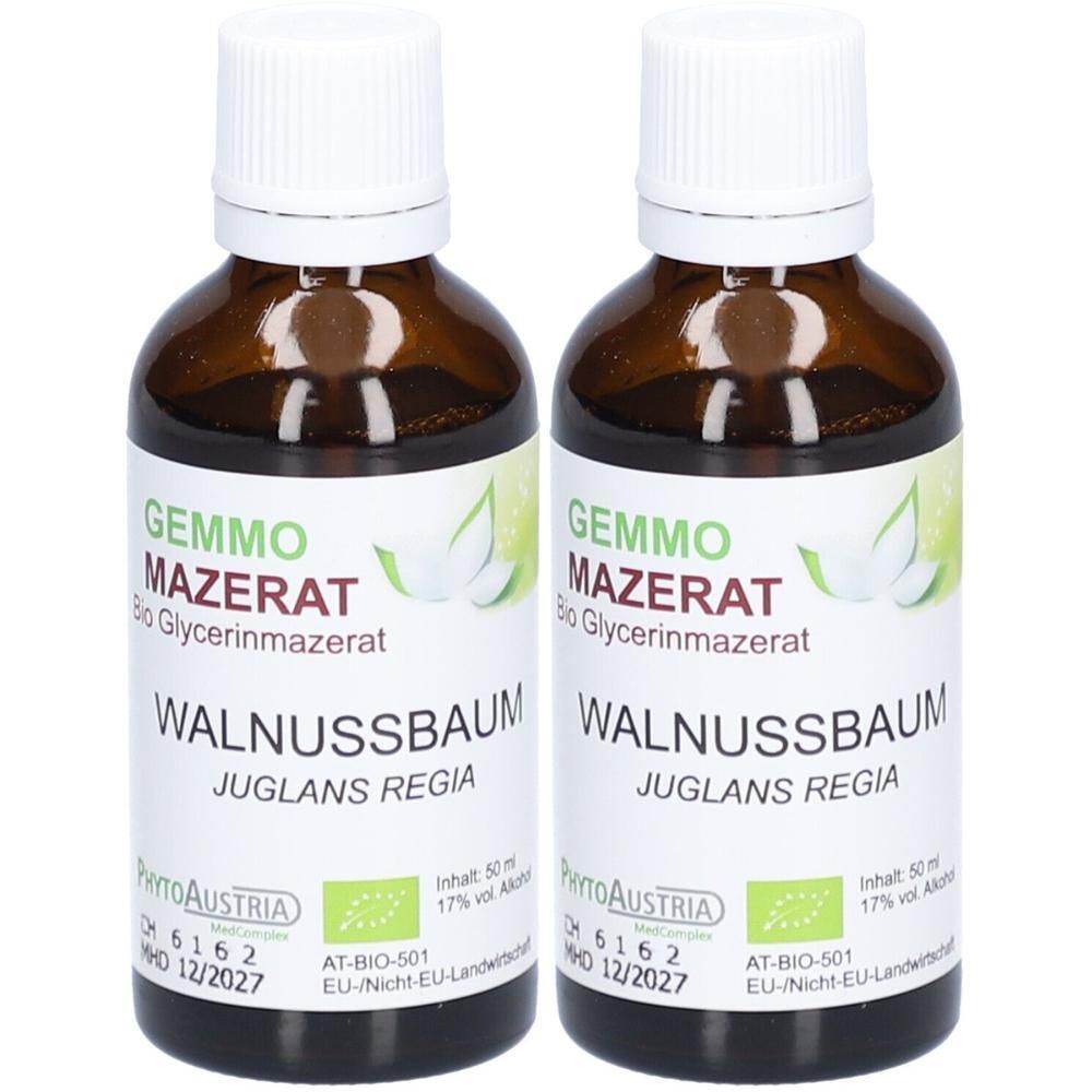 Zwei braune Glasflaschen mit weißem Verschluss, gefüllt mit Walnussbaum Gemmo Mazerat.