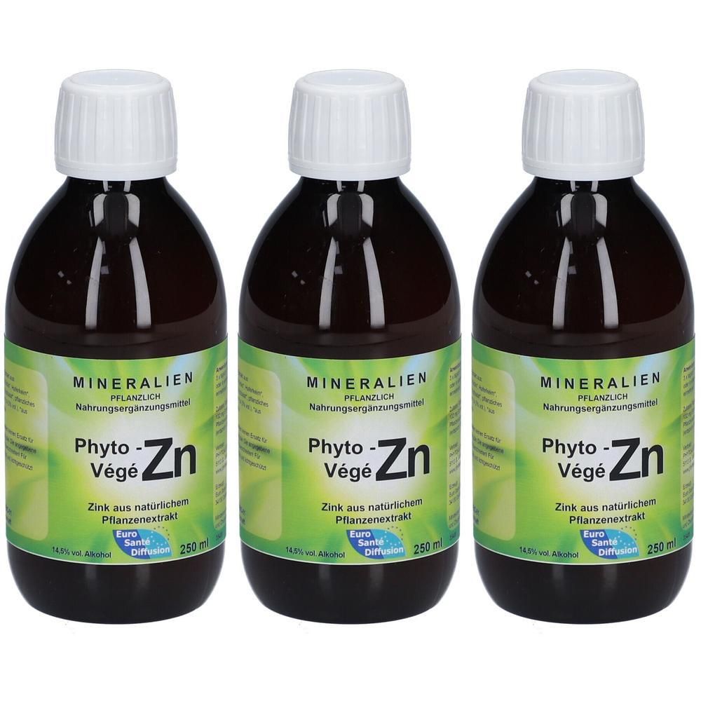 Drei braune Glasflaschen mit weißem Schraubverschluss, gefüllt mit flüssigem Nahrungsergänzungsmittel. Etikett mit 'Phyto-Zn'.
