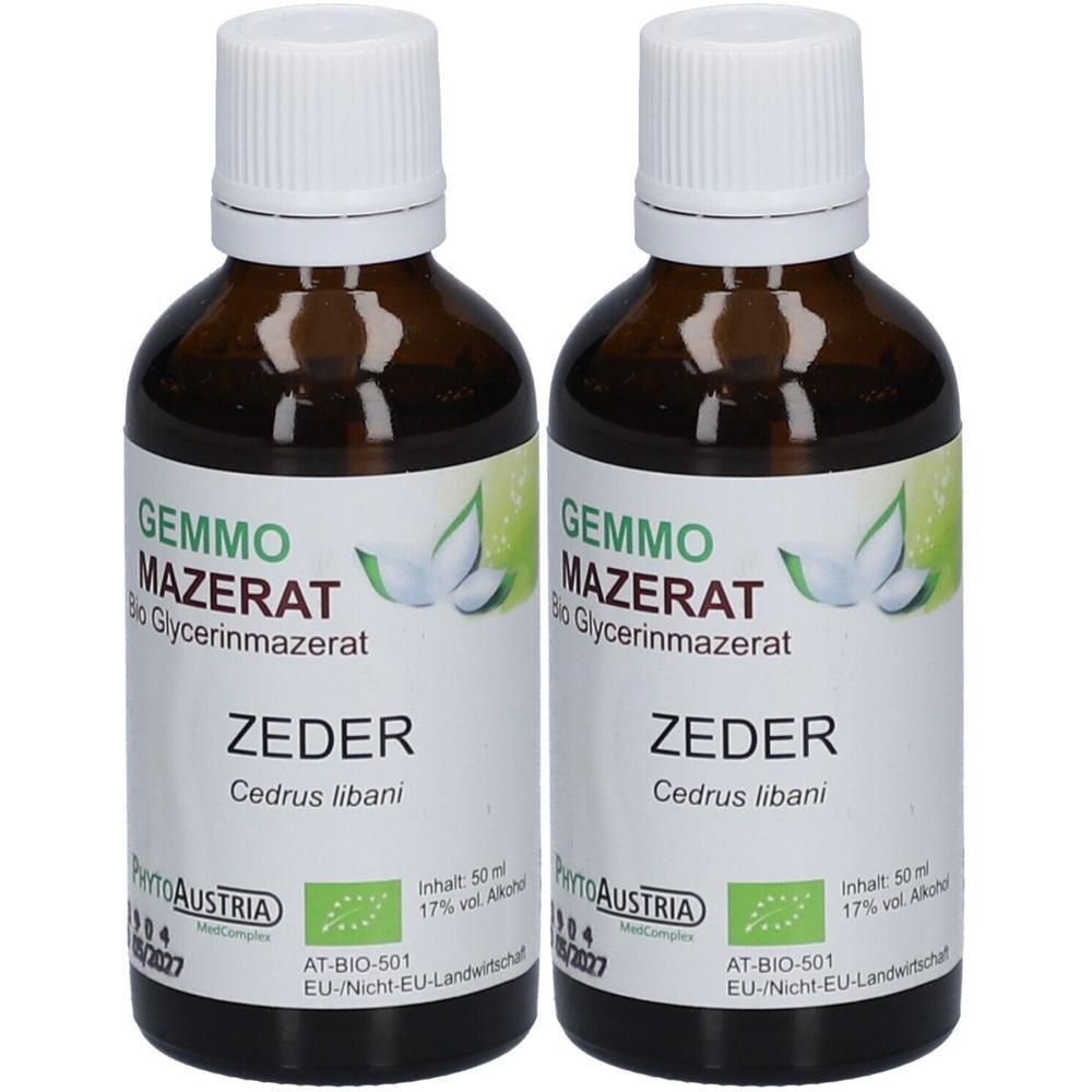 Zwei braune Glasflaschen mit weißem Verschluss, gefüllt mit GEMMO MAZERAT BIO ZEDER.