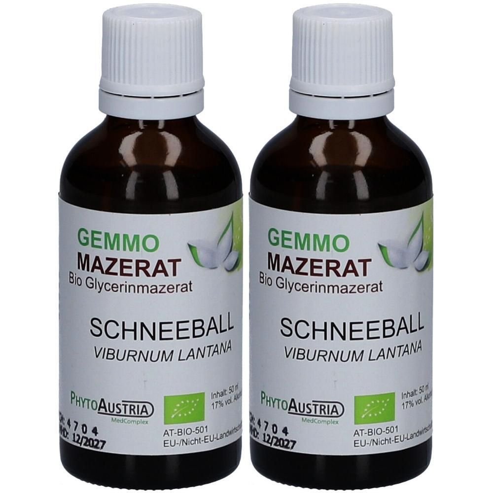 Zwei braune Glasflaschen mit weißem Schraubverschluss, gefüllt mit flüssigem Produkt. Etiketten zeigen "GEMMO MAZERAT Bio Glycerinmazerat SCHNEEBALL VIBURNUM LANTANA".