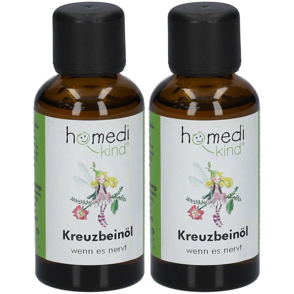 Zwei Flaschen homedi-kind® Kreuzbeinöl mit schwarzem Deckel und Etikett mit Fee.