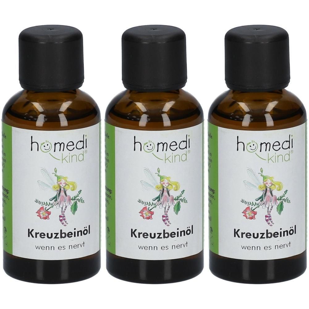 Drei Flaschen homedi-kind® Kreuzbeinöl mit schwarzem Deckel und Etikett mit Fee.