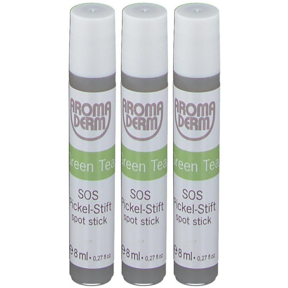 Drei AROMA DERM Green Tea SOS Pickel-Stifte, je 8ml. Weiße Kappe, grauer Behälter mit grünen und weißen Etiketten.