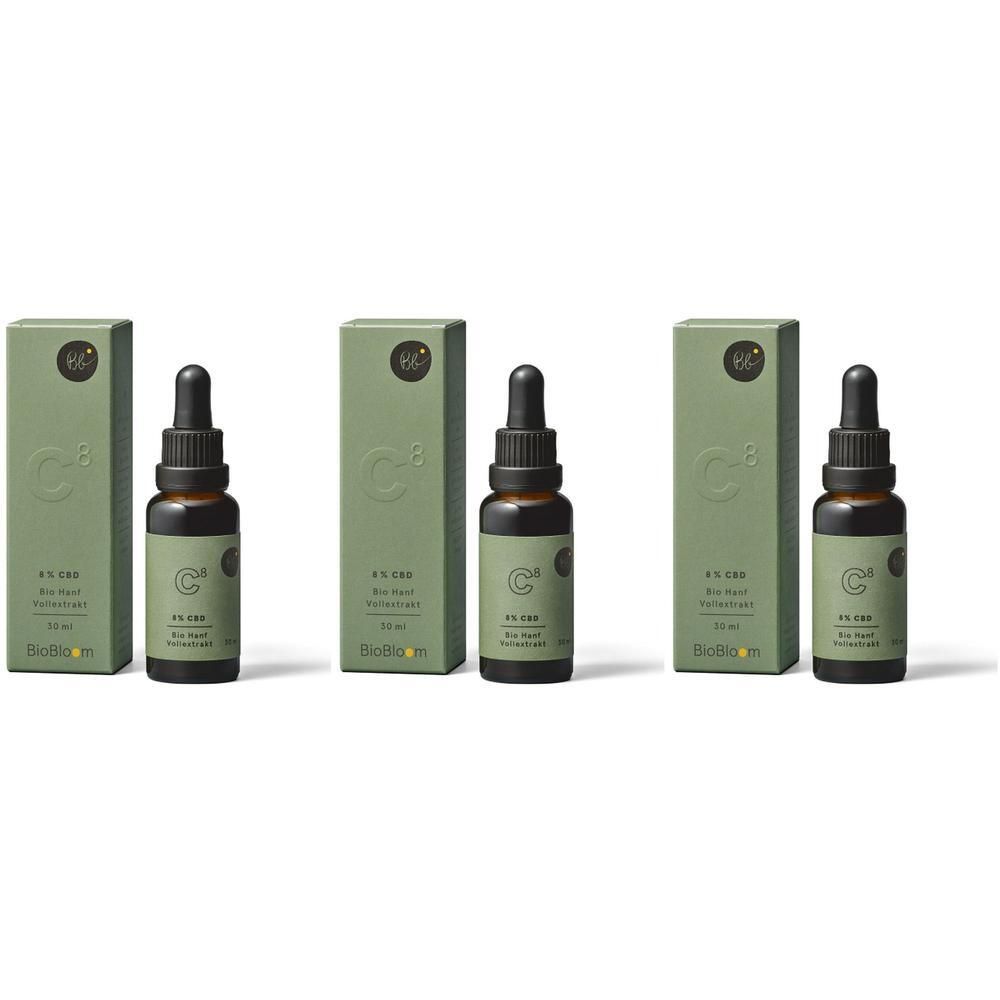 Drei Flaschen mit Tropfer und grüne Verpackungen. Aufschrift: 8% CBD, Bio-Hanf, BioBloom. Braune Glasflaschen.