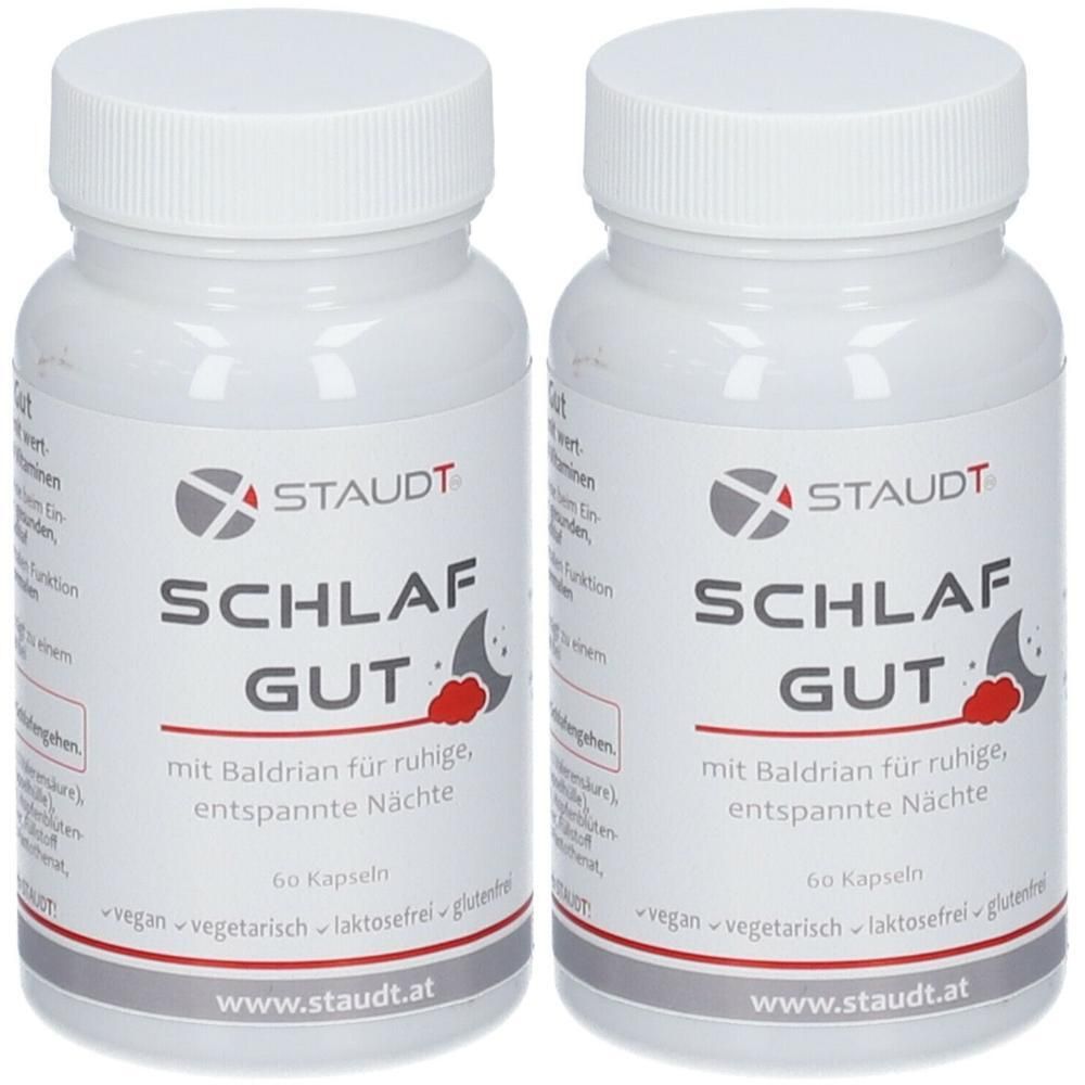 Zwei weiße Pillendosen mit Schraubverschluss. Aufschrift: STAUDT SCHLAF GUT. Enthält 60 Kapseln. Vegan, vegetarisch, laktosefrei, glutenfrei.