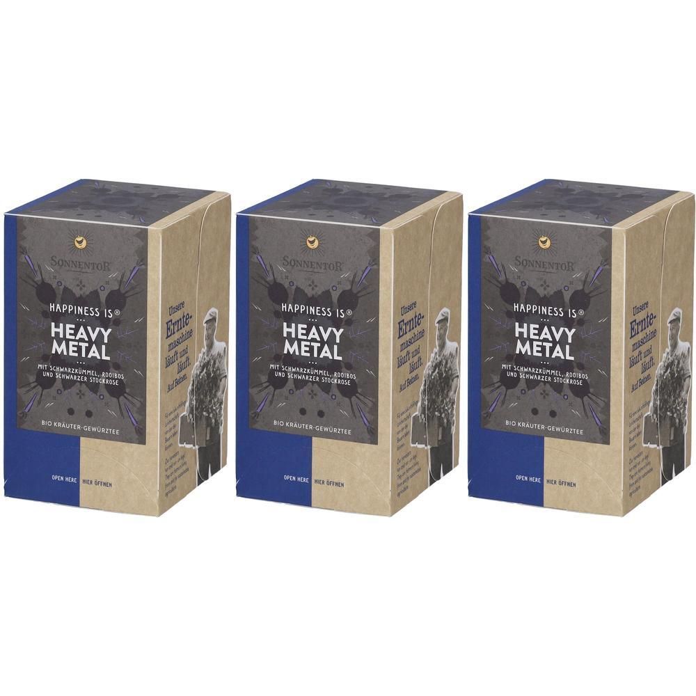 Drei rechteckige Kartons mit Aufschrift "Happiness is Heavy Metal". Aufdrucke in Schwarz und Blau. Marke SonnentoR® sichtbar.