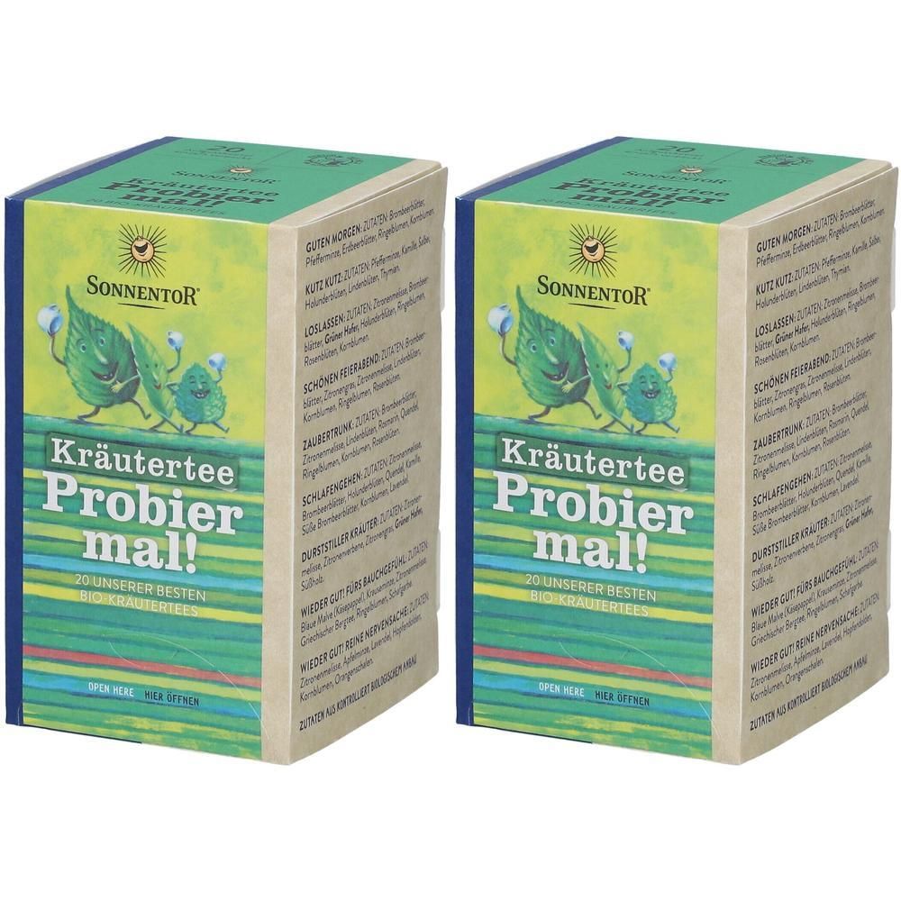 Zwei rechteckige Kartons. Aufdruck: SonnentoR, Kräutertee Probier mal! Grün-blaue Verpackung mit Illustrationen.