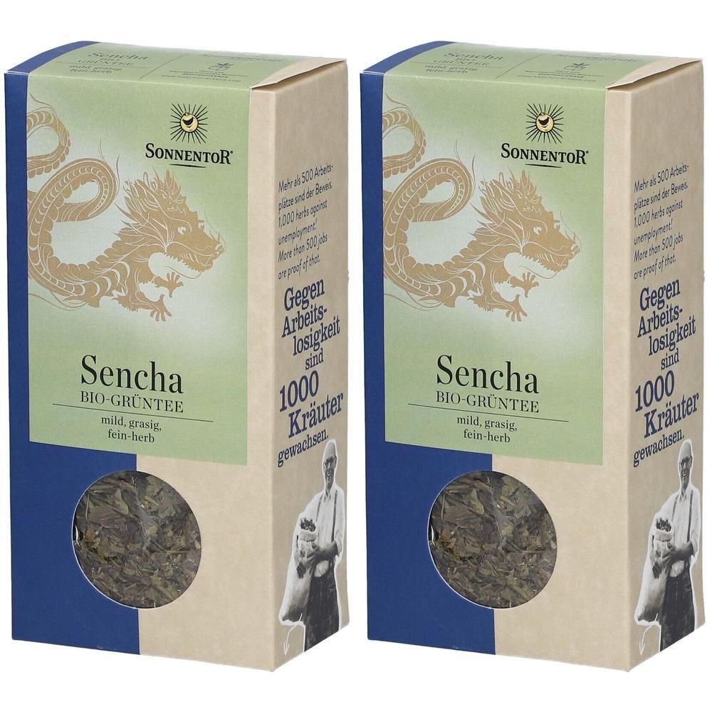 Zwei Kartons Sencha Bio-Grüntee. Aufdrucke: SonnentoR, Sencha, 1000 Kräuter. Sichtfenster mit grünem Tee.