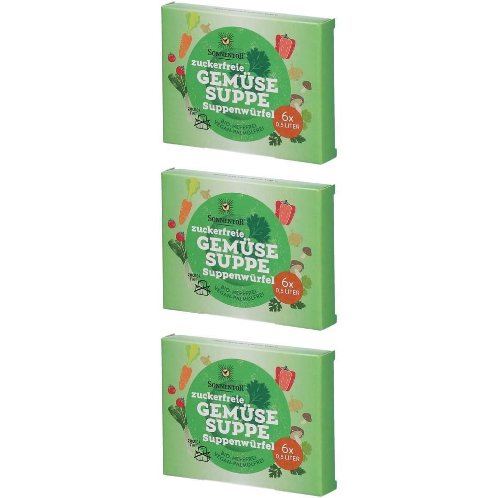 Drei grüne Schachteln mit Aufschrift "zuckerfreie Gemüsesuppe Suppenwürfel". Jede Schachtel zeigt Gemüse-Illustrationen und das Logo.