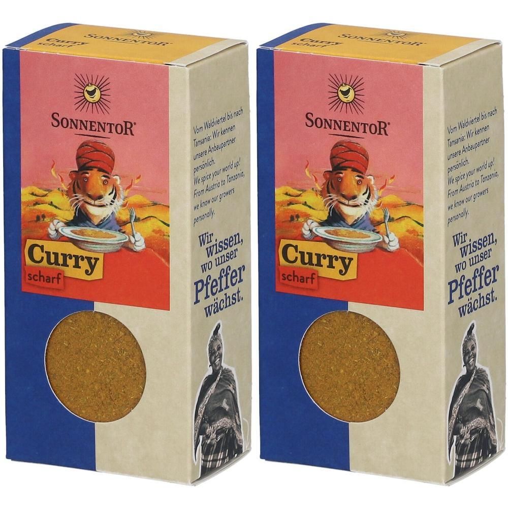 Zwei Kartonverpackungen mit SonnentoR Curry scharf. Aufdruck: Curry, scharf, Logo, Text. Sichtfenster mit Inhalt.