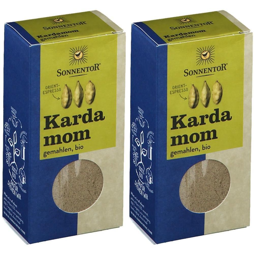 Zwei Kartonverpackungen mit SonnentoR Kardamom Bio gemahlen. Blaue und beige Verpackung mit grünem Feld und Produktnamen.
