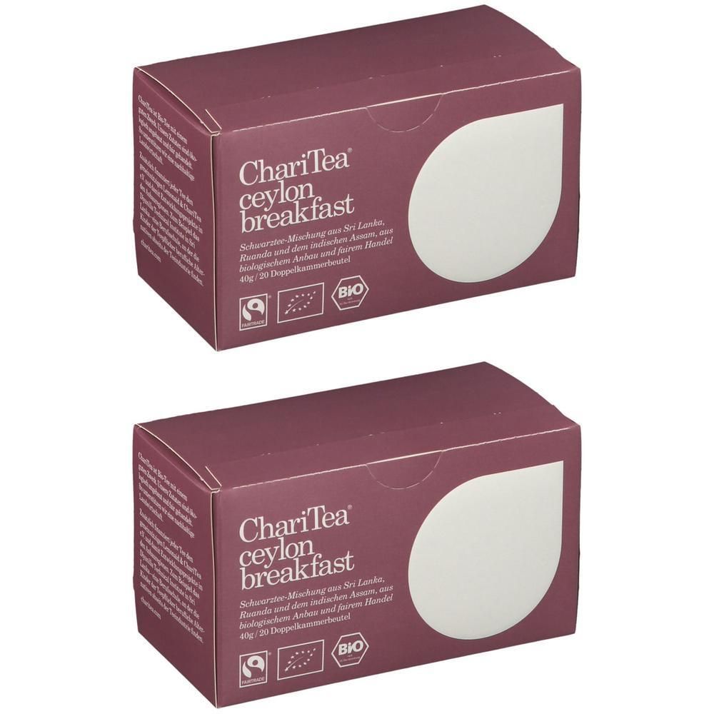 Zwei rechteckige Kartons. Aufdruck: ChariTea ceylon breakfast, Bio-Siegel. Dunkelroter Hintergrund, weißes Blatt-Design.